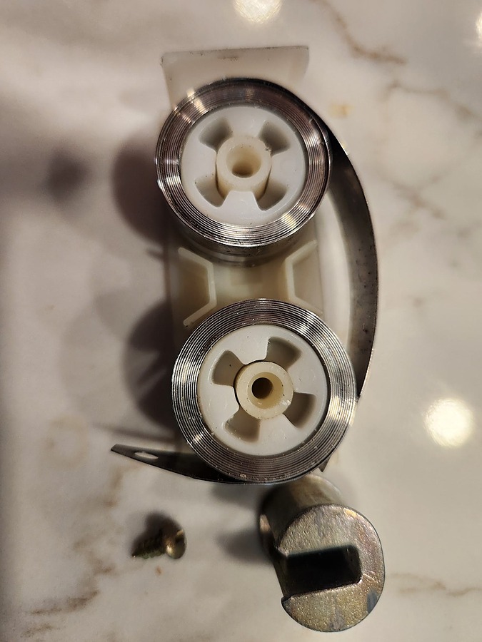 spring coil and pivot